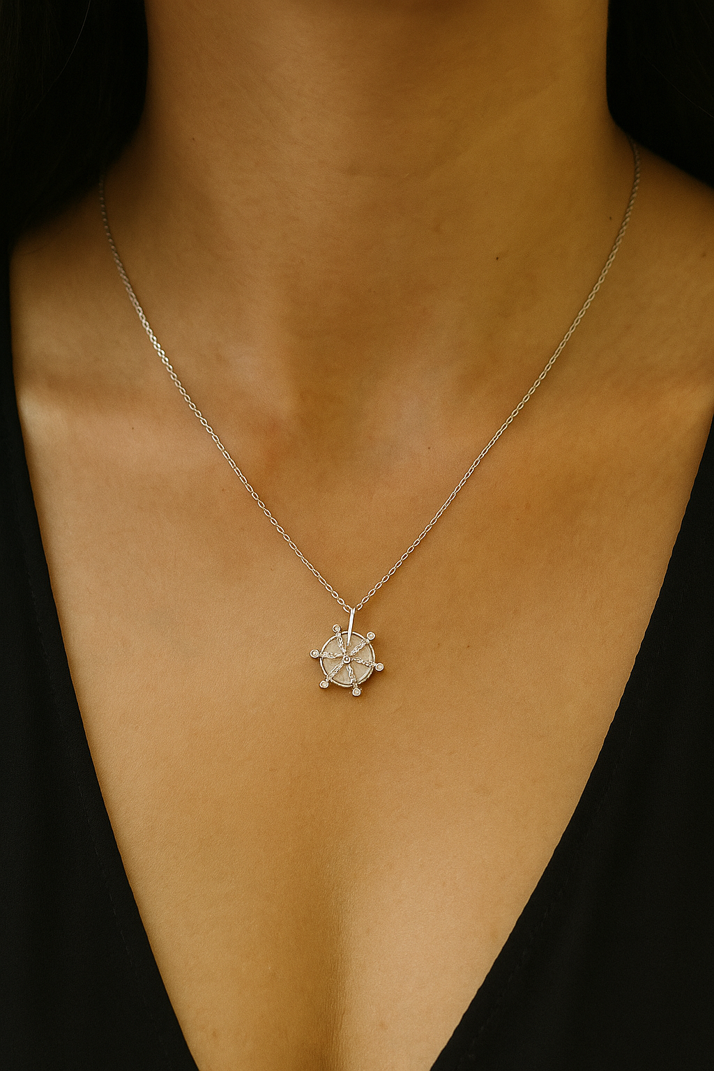 Elegant silver pendant featuring a unique geometric design