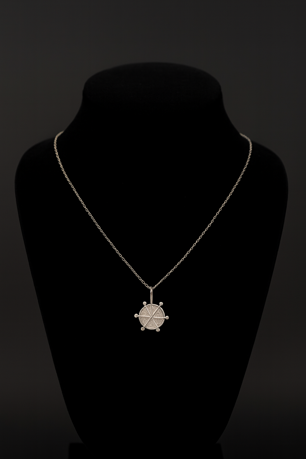 Elegant silver pendant featuring a unique geometric design