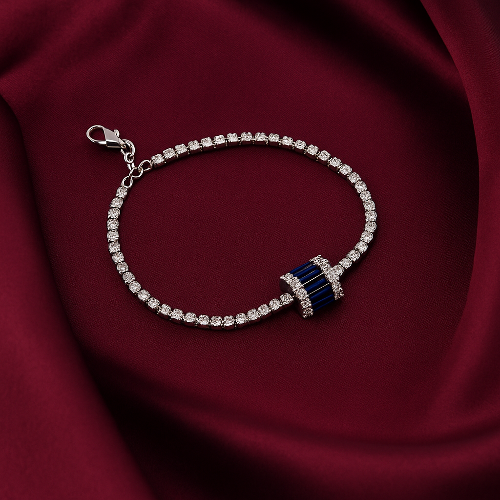 silver tennis bracelet with a bold blue crystal centerpiece