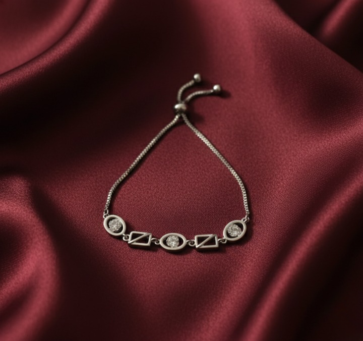 Silver bracelet blends modern geometry with effortless sparkle, featuring an adjustable slider for the perfect fit.