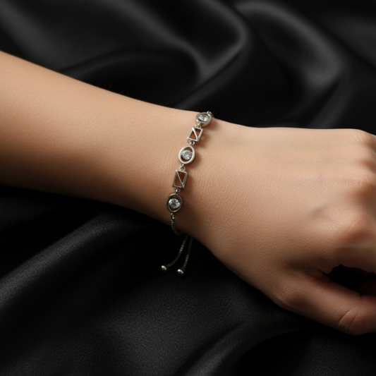 Silver bracelet blends modern geometry with effortless sparkle, featuring an adjustable slider for the perfect fit.