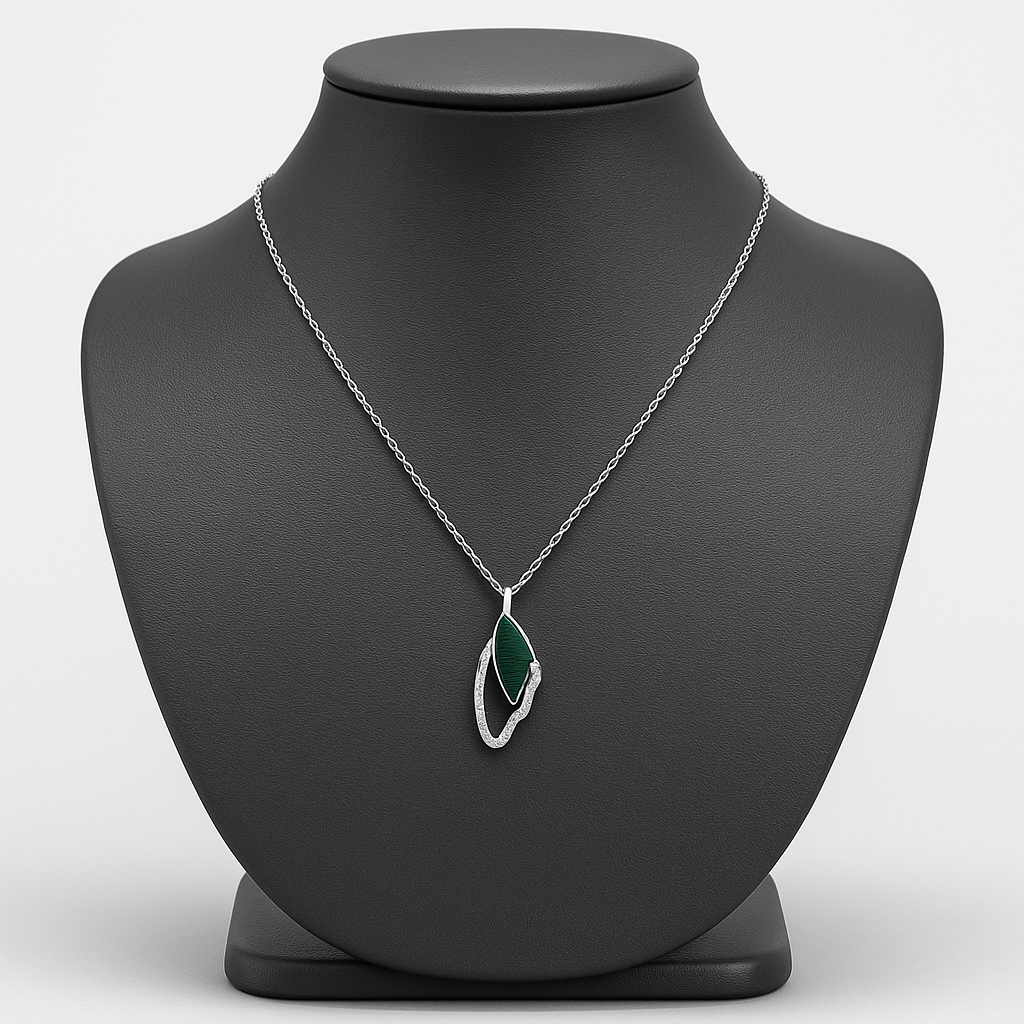 Elegant silver Butterfly Wing pendant with a touch of green enamel and sparkling stones
