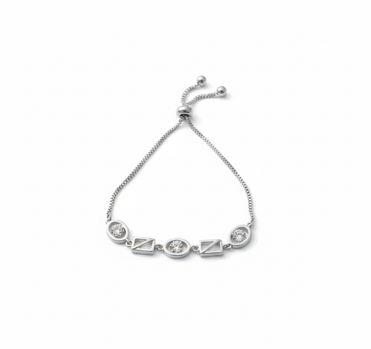 Silver bracelet blends modern geometry with effortless sparkle, featuring an adjustable slider for the perfect fit.