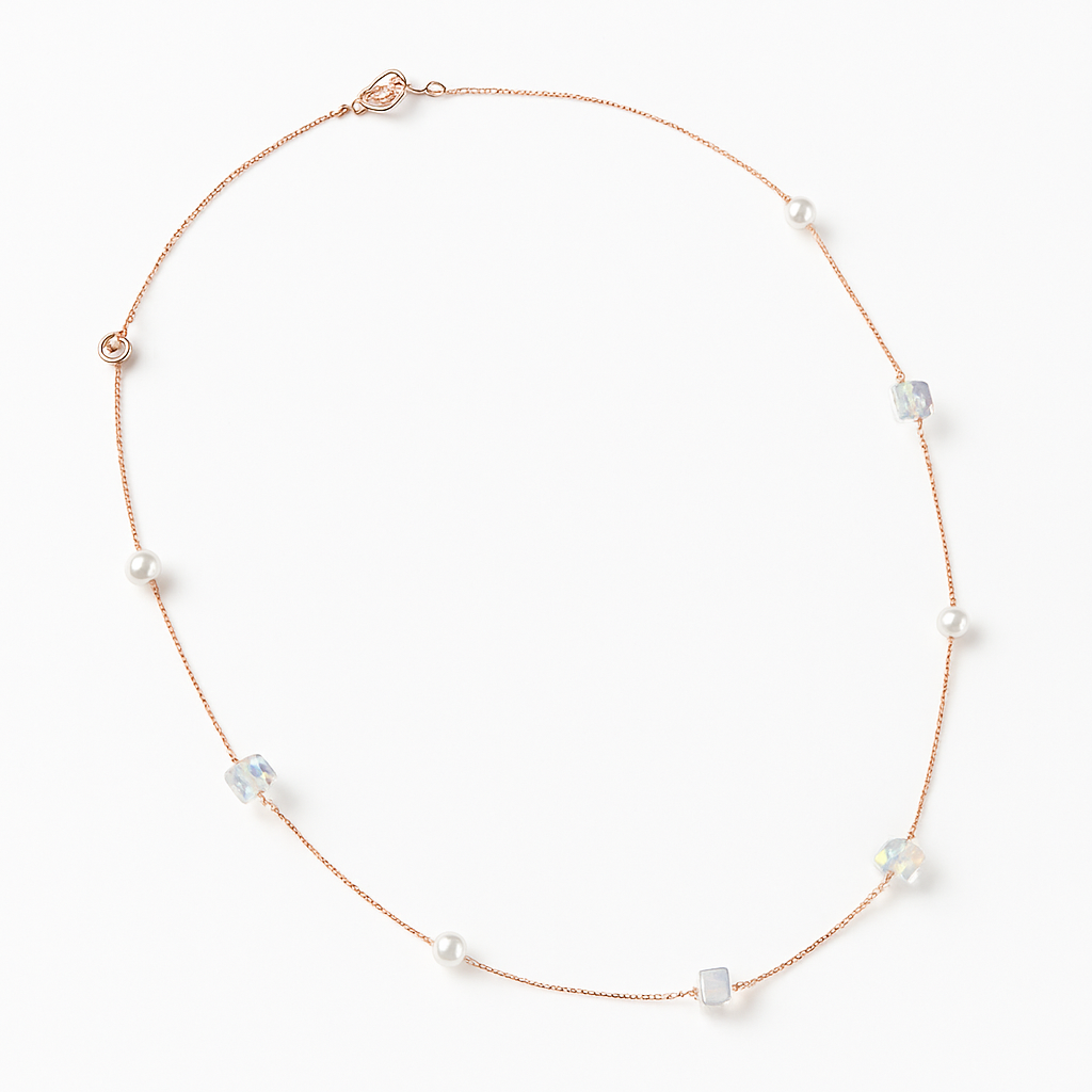 Delicate rose gold necklace adorned with pearls and crystals
