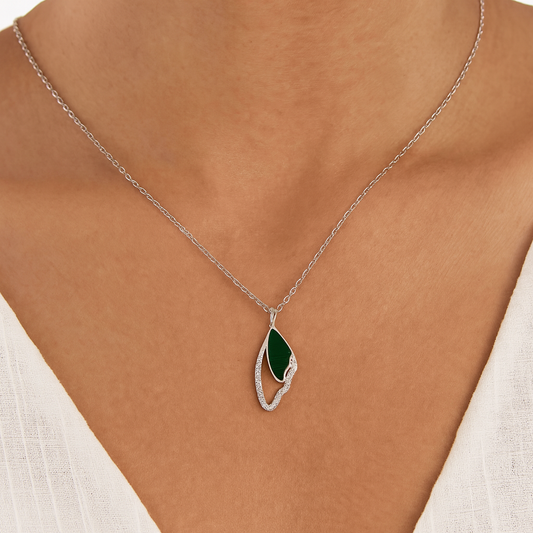 Elegant silver Butterfly Wing pendant with a touch of green enamel and sparkling stones
