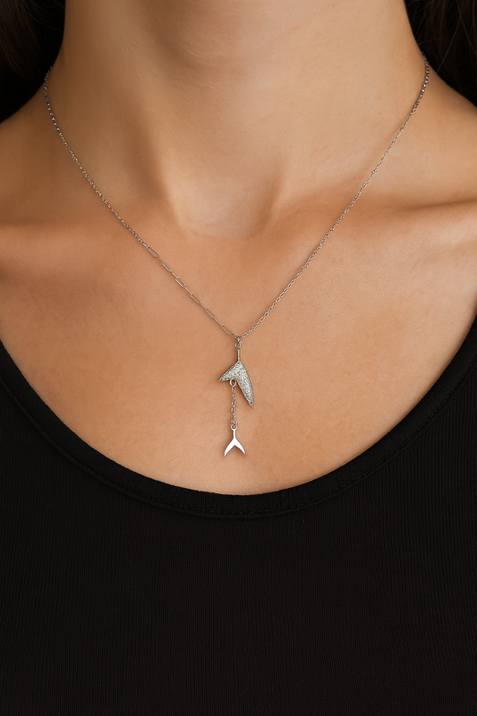 Stylish silver pendant featuring a sleek double arrow design