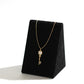 Charming rose gold key pendant with a heart design