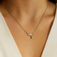 Elegant silver pendant featuring a sparkling wing design with a dangling star charm
