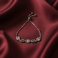 Silver bracelet blends modern geometry with effortless sparkle, featuring an adjustable slider for the perfect fit.