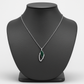 Elegant silver Butterfly Wing pendant with a touch of green enamel and sparkling stones