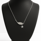 Elegant silver pendant featuring a sparkling wing design with a dangling star charm