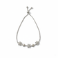 Silver bracelet featuring charming pave-set and crystal flowers with smooth silver hearts.